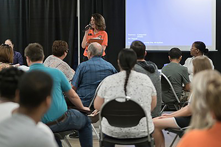 Speaker addresses crowd