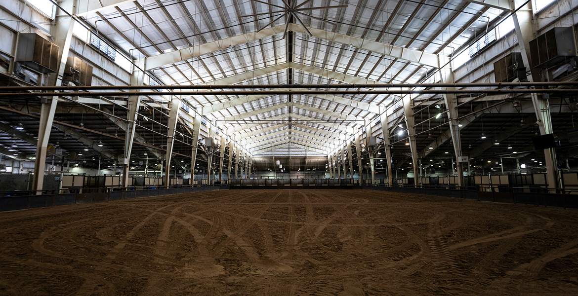 Photo of expansive empty arena at the State Fair.