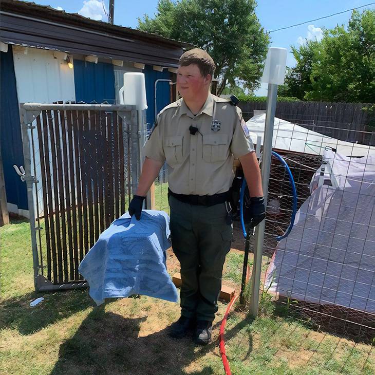 Animal Control Officer Jared Nunley in search of wandering animals.