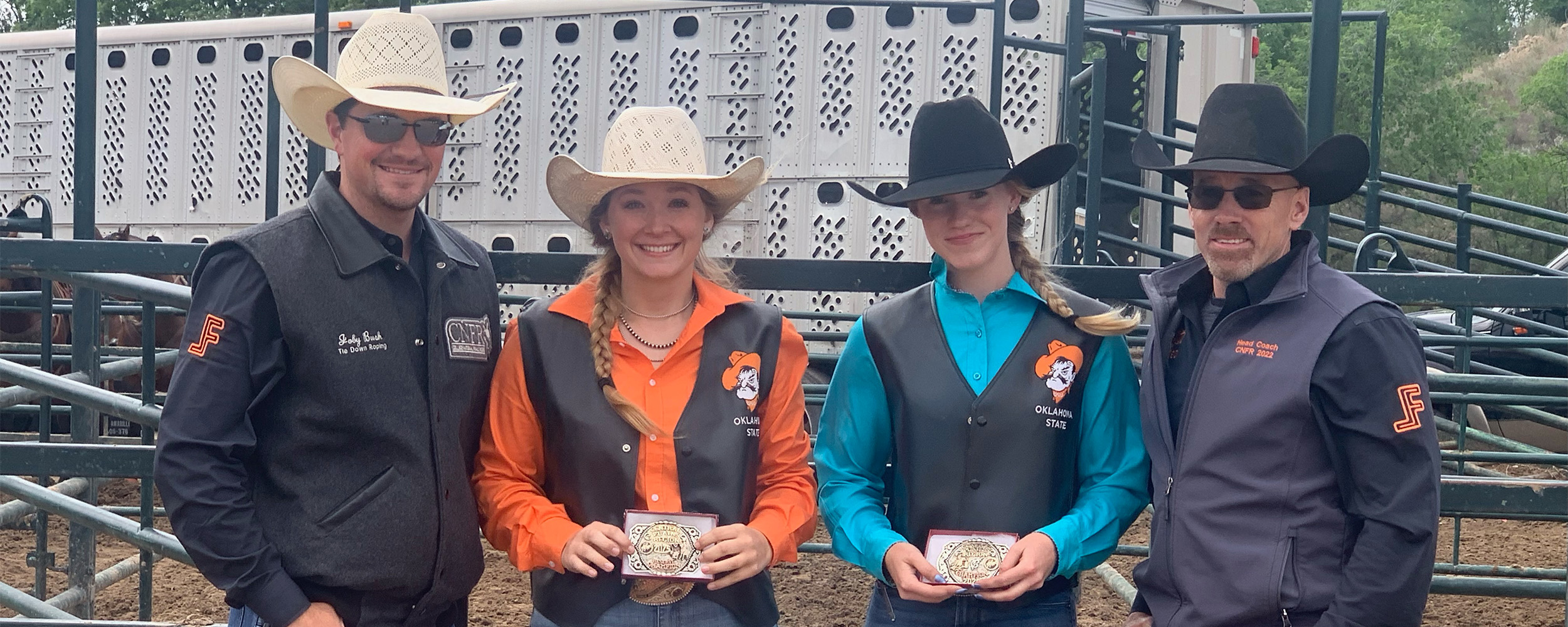 OSU Rodeo coaches Joby Bush and Cody Hollingsworth stand with CNFR qualifiers Morgan Bagnell and Carli Hawkins after the final rodeo of the spring season.