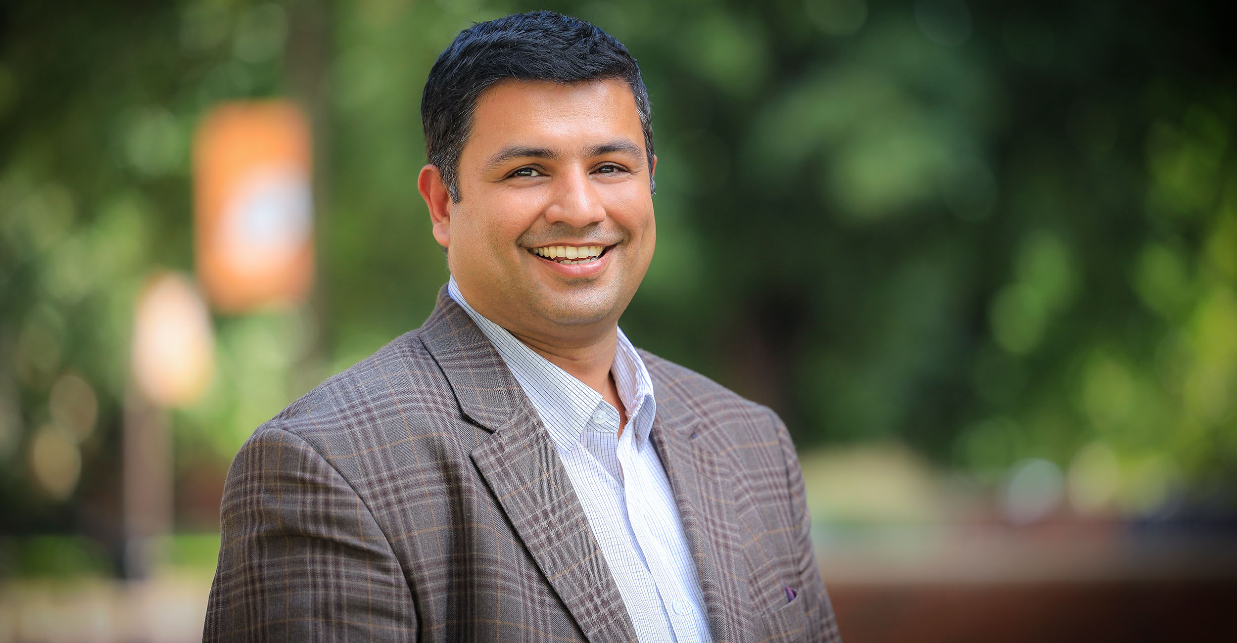 Man smiling at camera.