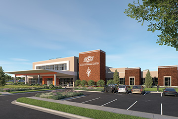An exterior rendering of the new veterinary teaching hospital shows a building made of brick and windows with a portion of the building having a second story. The OSU Veterinary Teaching Hospital sign is shown to the right of the main entrance.