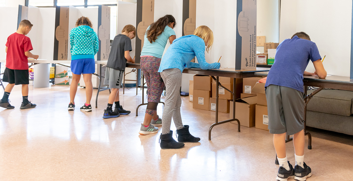 Political Science class hosts mock election for elementary students