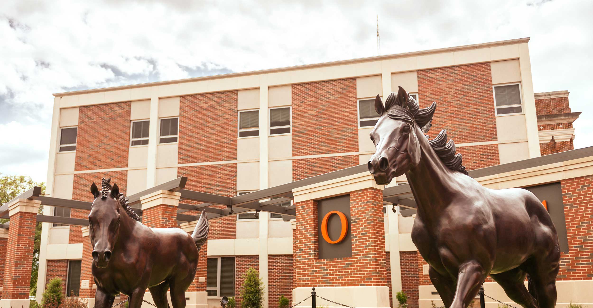 Paul Miller Journalism and Broadcasting building behind the OSU Welcome Plaza.