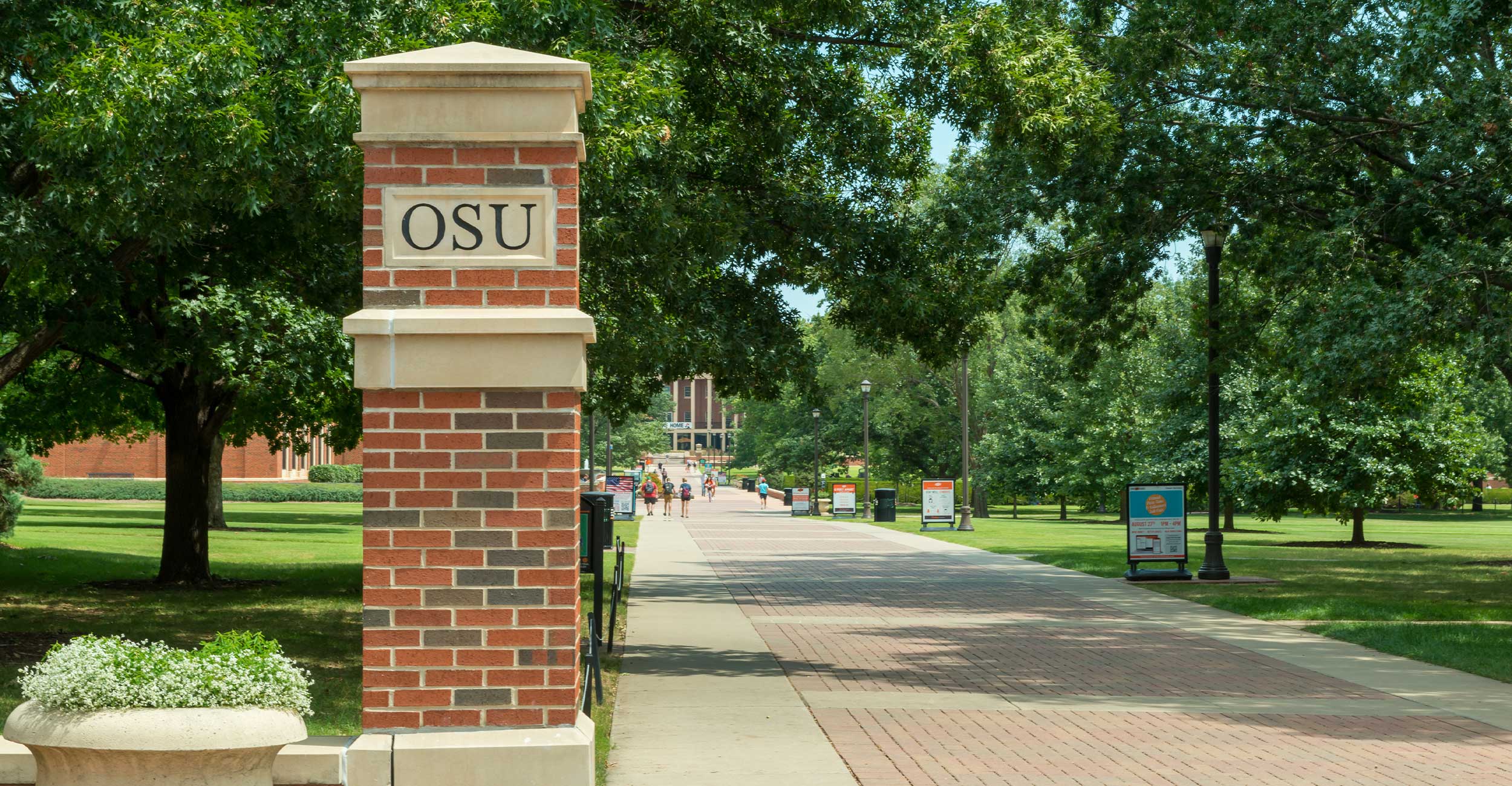 OSU pillar leading to the sidewalk