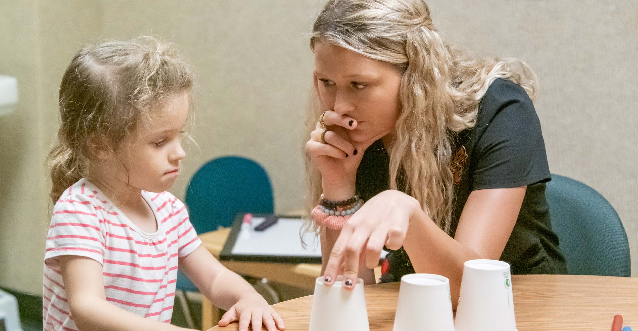 An instructor works with a participant at Reading Readiness Camp in 2021. Photo by Jason Wallace.