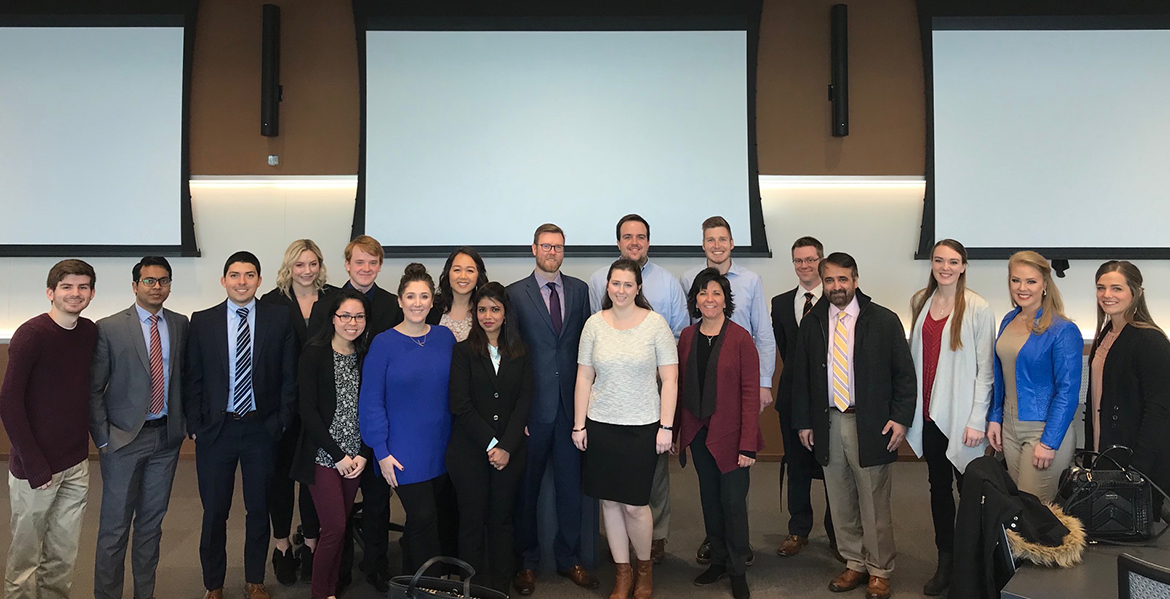 Jake Regier poses with OSU MBA students