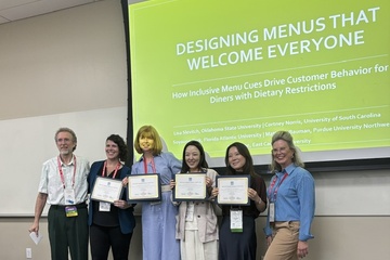 Research team presenting at ICHRIE.