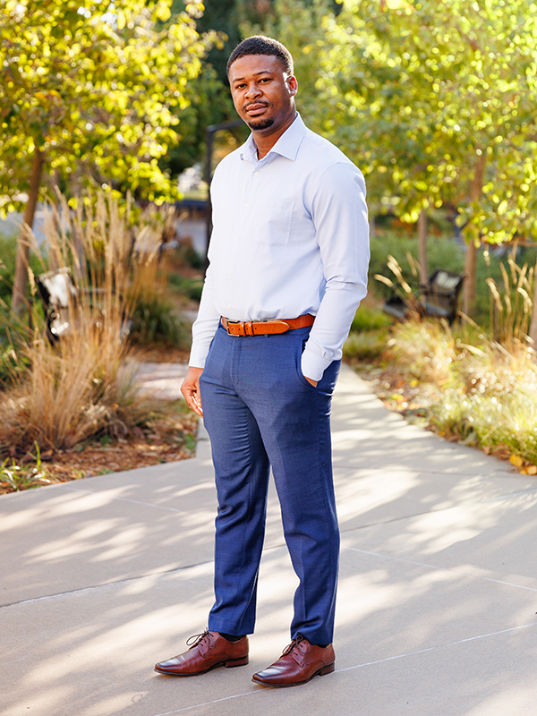 Abraham Terrah standing outside the Nancy Randolph Davis Building