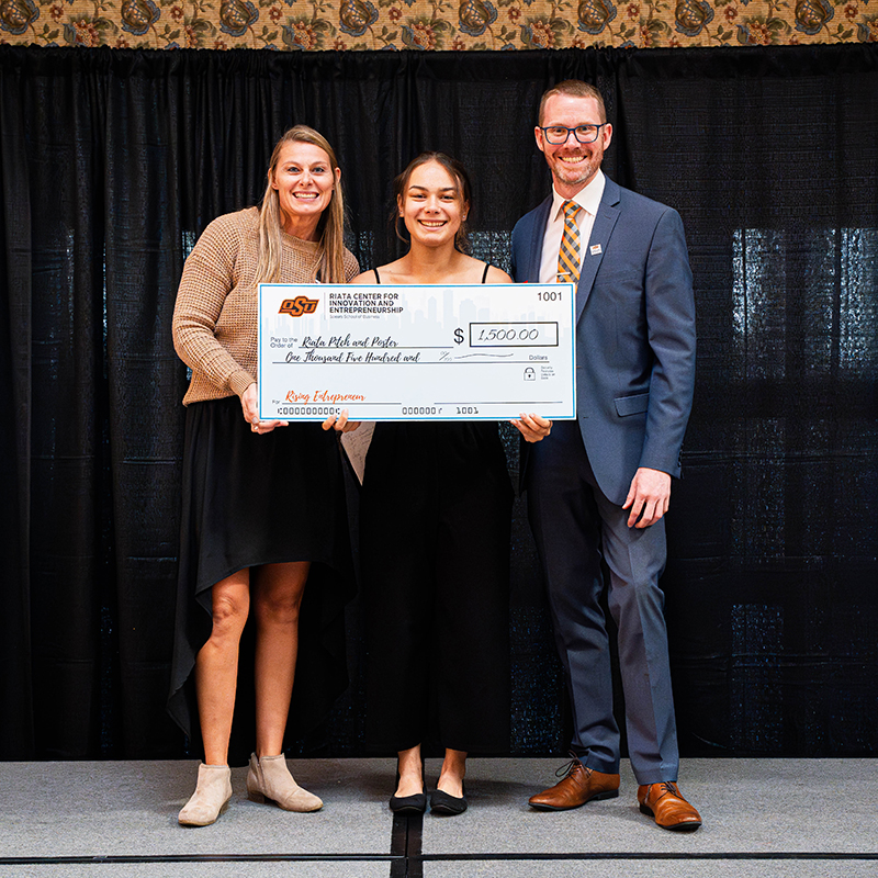 Alison Conway Alison Conway accepts a prize check.