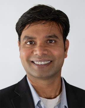 Cumulus Award winner Balaji Dhamodharan smiles for a portrait.