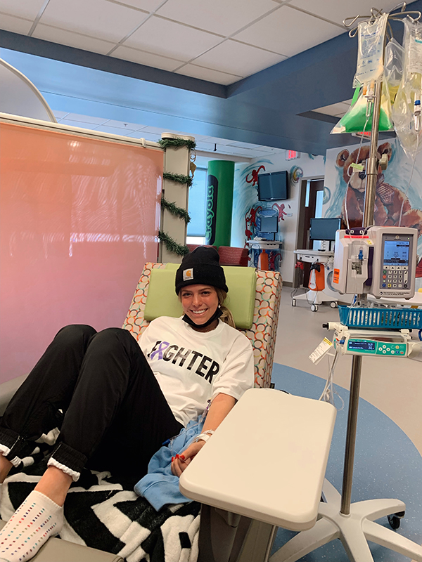 Brooklyn Hawkins hospital 2 a teenage girl sits in a bed in a children's hospital