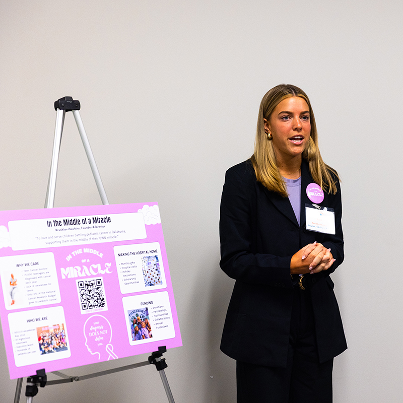Brooklyn presents A student presents her poster.