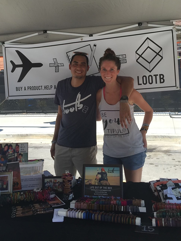 LOOTB merch The Buttons at their booth selling Life Out of the Box bracelets