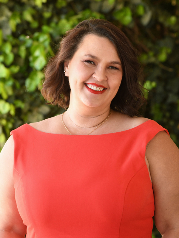 Carrie Bailey, an HTM student at OSU, smiles for a portrait.