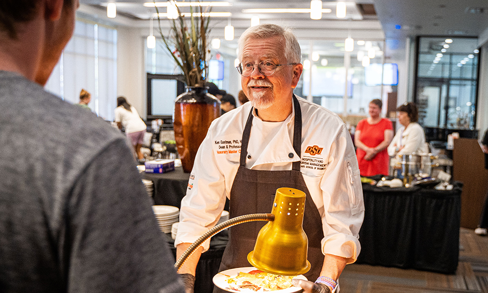 Dr. Ken Eastman learns how to cook at Taylor's.