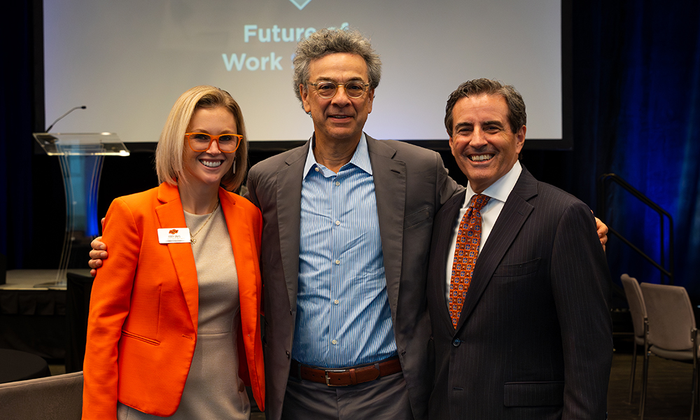 Stephen Dubner, center, with CFW director Dr. Abbey Davis and assistant dean Dr. Marc Tower at the Future of Work Summit.