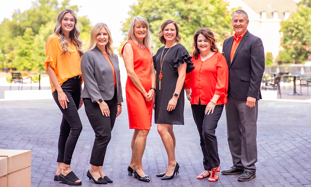 Eastin Center staff in the Business Building courtyard.