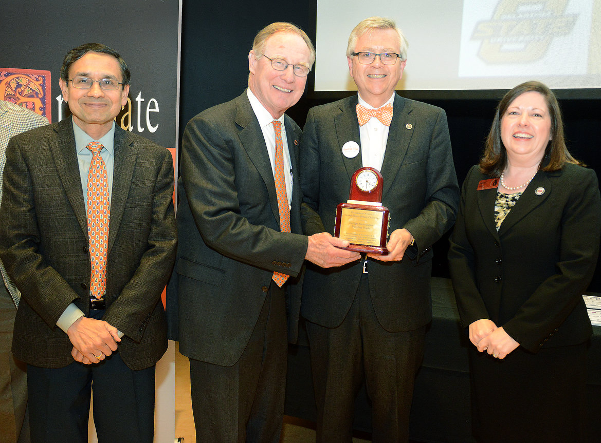 Vice Dean Ramesh Sharda, President Burns Hargis, Spears School of Business Dean Ken Eastman and Graduate College Dean Sheryl Tucker