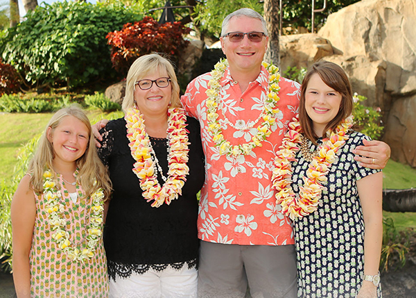 Carson Guinn (far right) and her sister Darby, her mother Kim and her father Lynn.