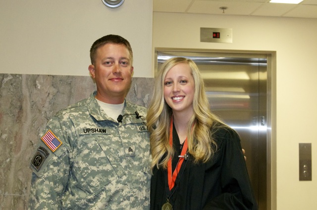Sgt. Chris Upshaw of the U.S. Army flew to Stillwater from Guam to surprise his sister, Lauren Reid, prior to her graduation from Oklahoma State University's Spears School of Business on Saturday, May 4. Reid, from Perry, Okla., graduated with a general business degree. Sgt. Upshaw is deployed to Camp Covington on the Naval Base Guam. He surprised his sister by showing up at the Spears School's reception for graduates Saturday morning in the Student Union Ballroom.
