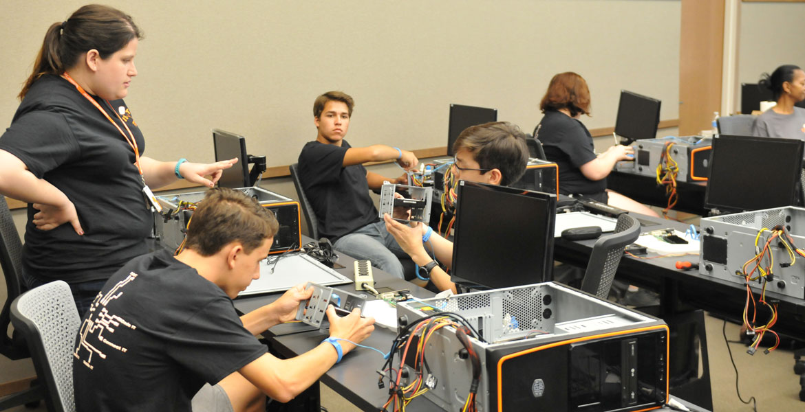 ISyTE campers building computers