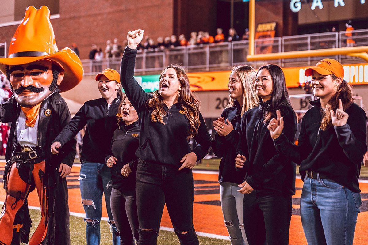 Jenna and her Cowgirl Golf teammates being introduced during an OSU football game.