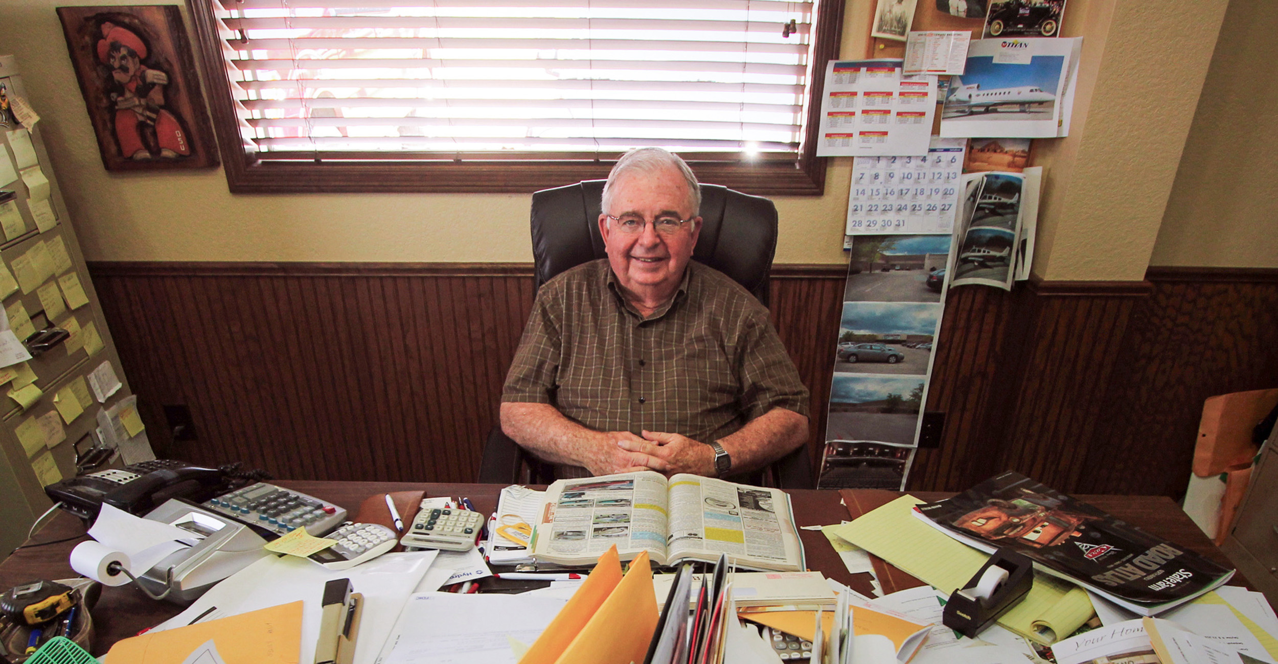 Kenny Mitchell sitting in his office