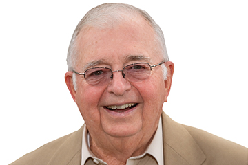 Professional headshot of Kenny Mitchell