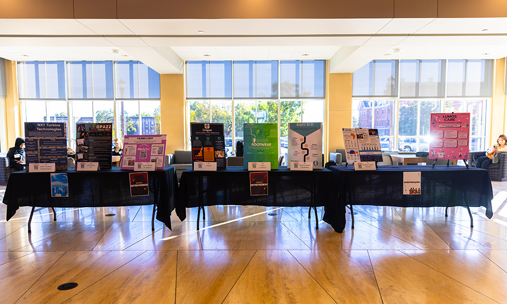 poster spread Posters are lined up across tables at the Student Innovation Expo.