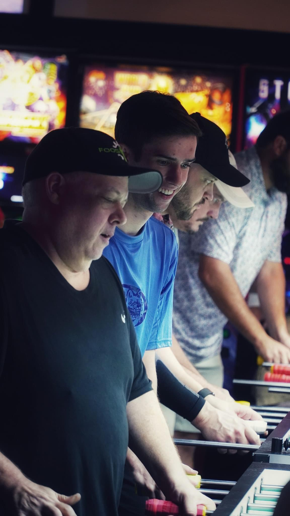 Reid Rector playing foosball at a tournament. 