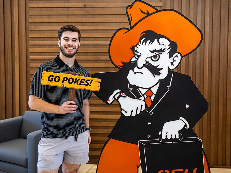 Wesley Cannatti poses with a Business Pete cutout on the first day of his senior year.