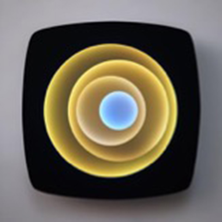 Abstract image showing concentric, softly glowing circular rings in yellow and gold radiating from a blue center, set within a black rounded square on a neutral background.