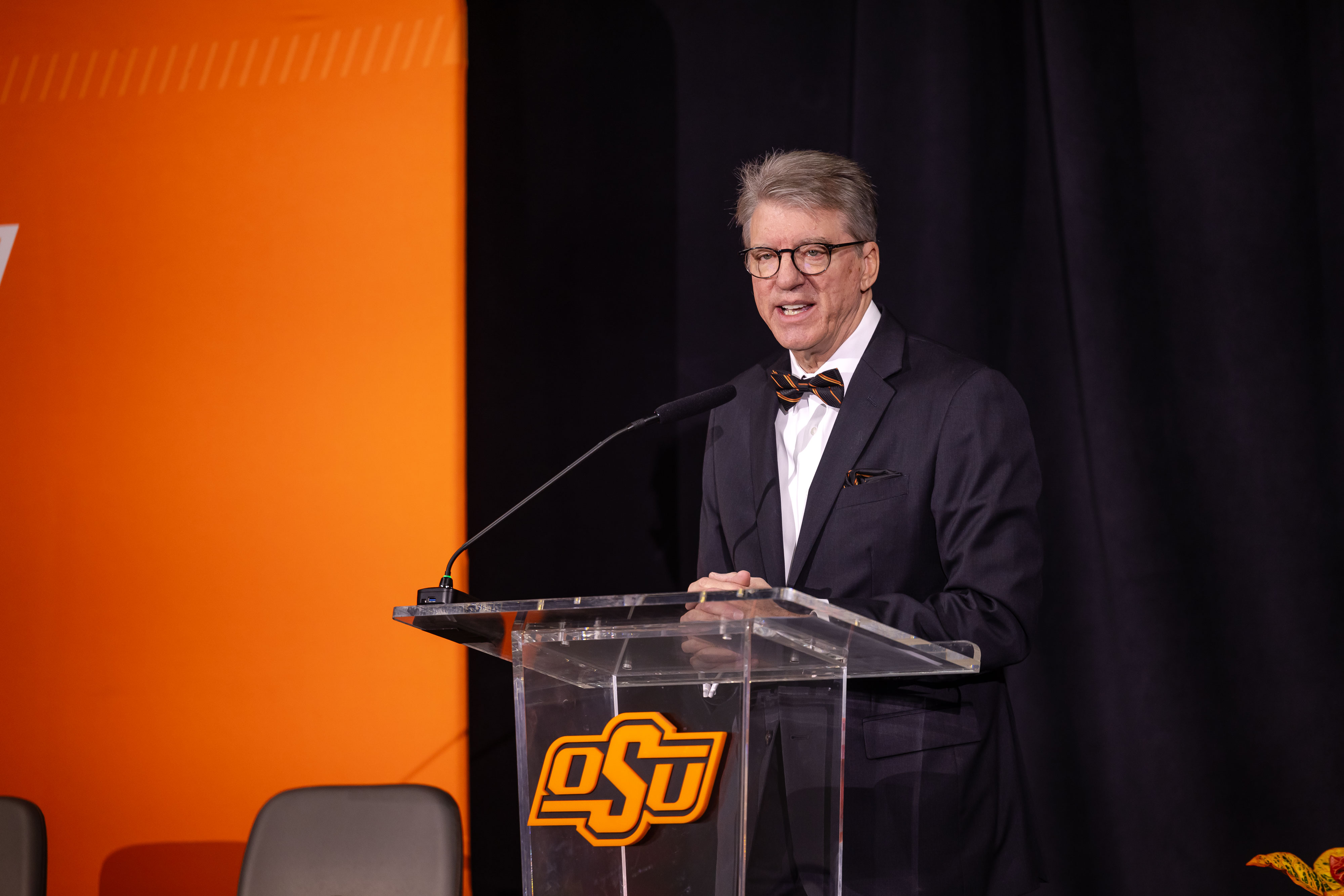 OSU President Jim Hess speaks from a podium