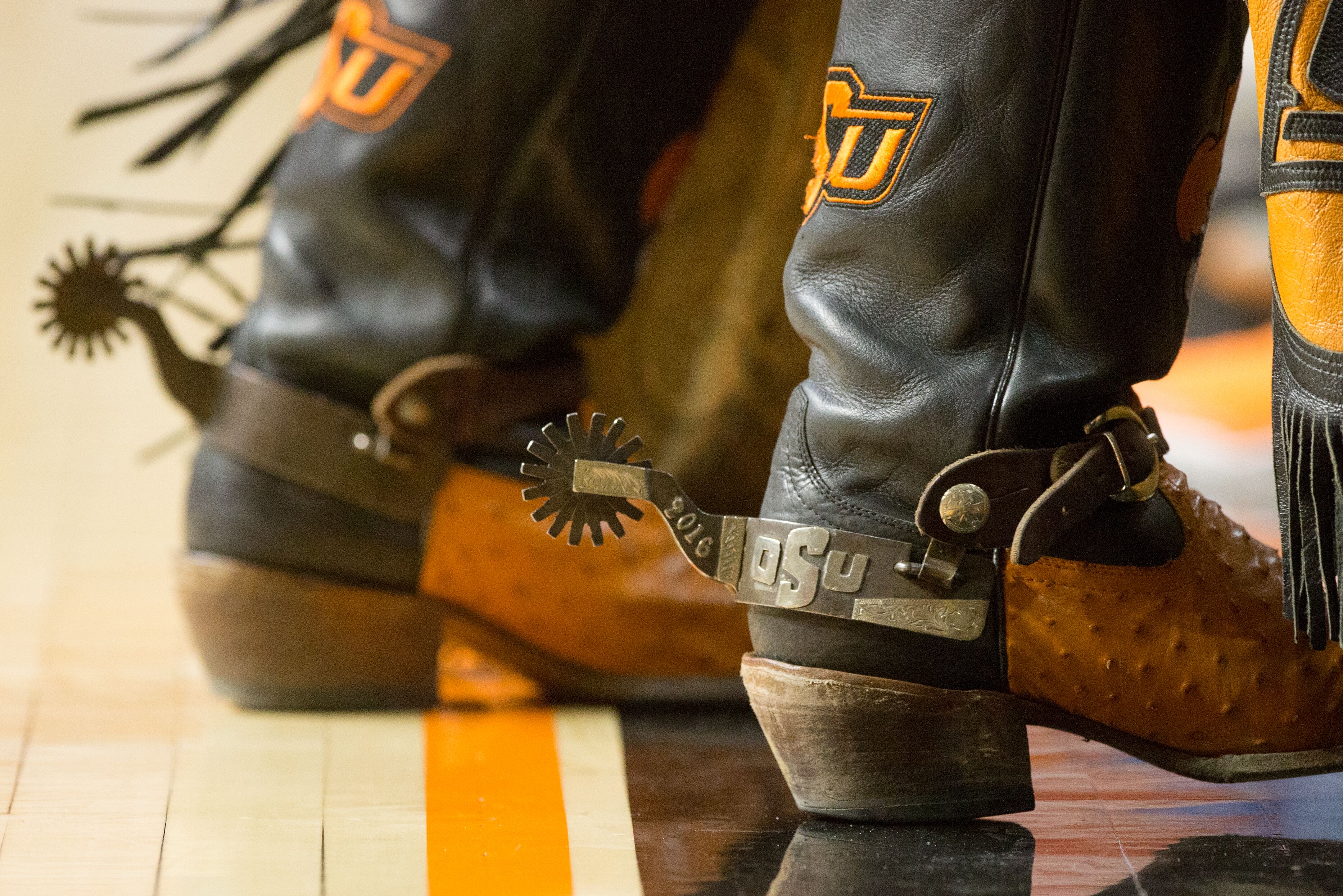 close up of Pistol Petes boots from the side, clearly showing the spurs.