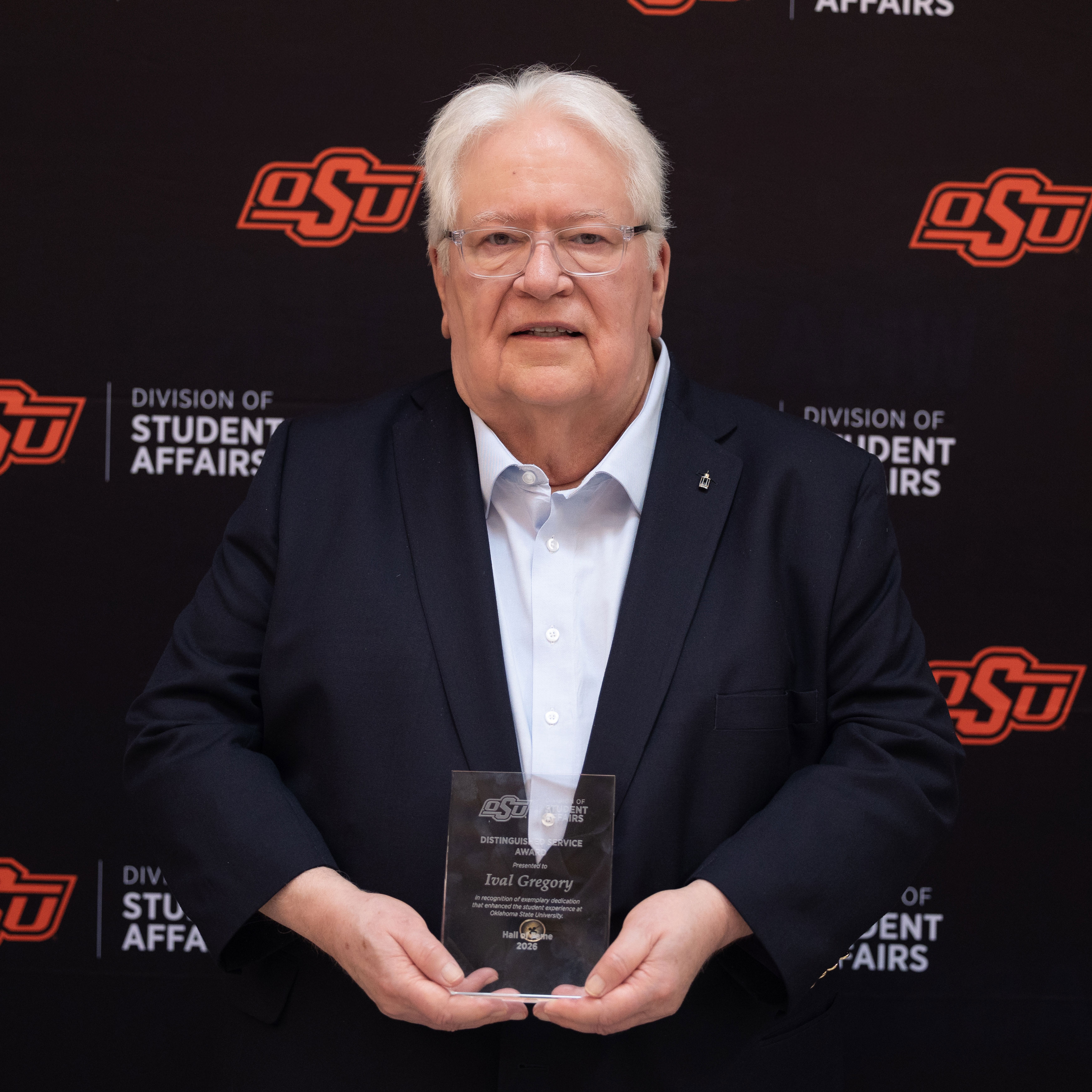 Ival Gregory with an award