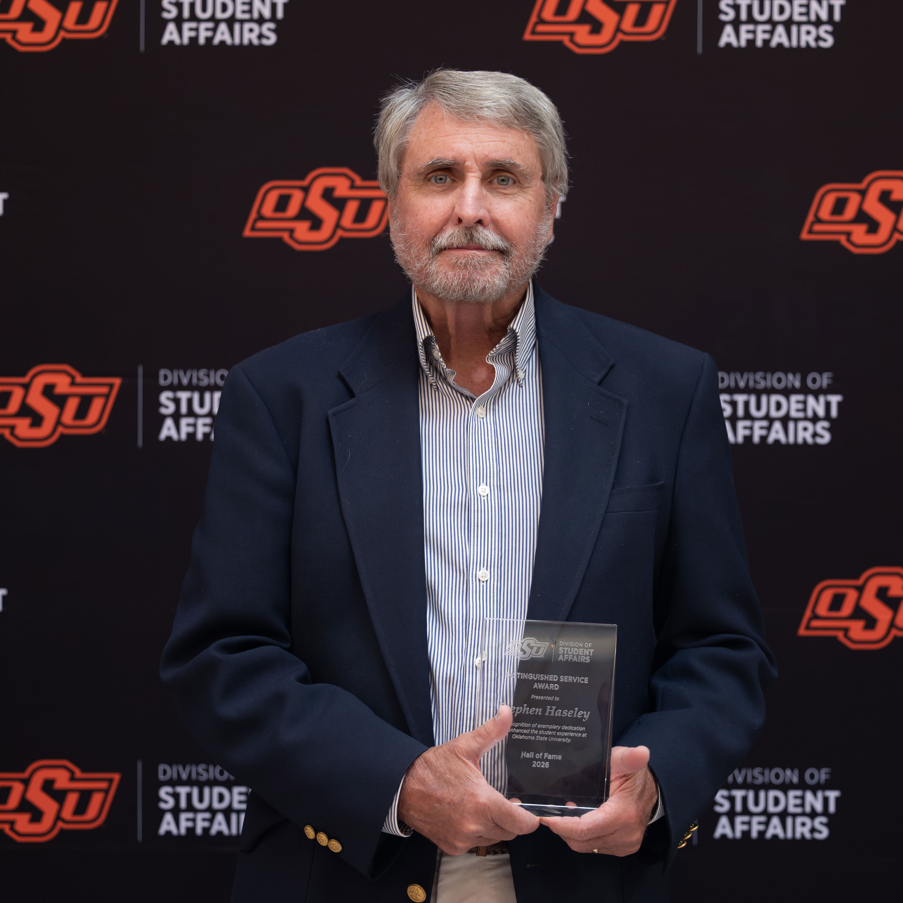 Stephan Haseley with an award