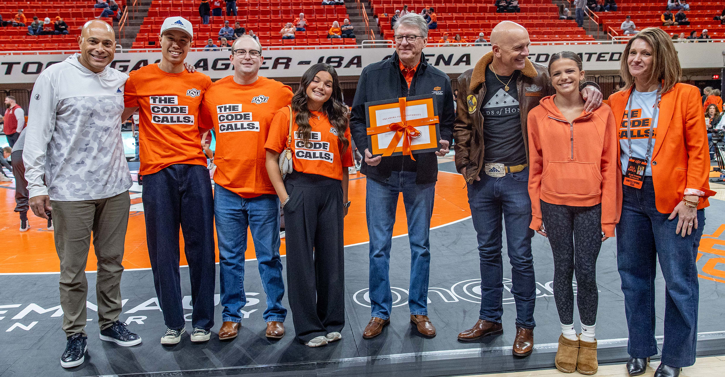 Pictured here are Luke Sherman of Folds of Honor, student scholarship recipients Tristen Matz, Travis Moore and Devynn Lomax, OSU President Jim Hess, Lt. Col. Dan Rooney of Folds of Honor and his daughter Devon, and OSU Foundation President Blaire Atkinson.