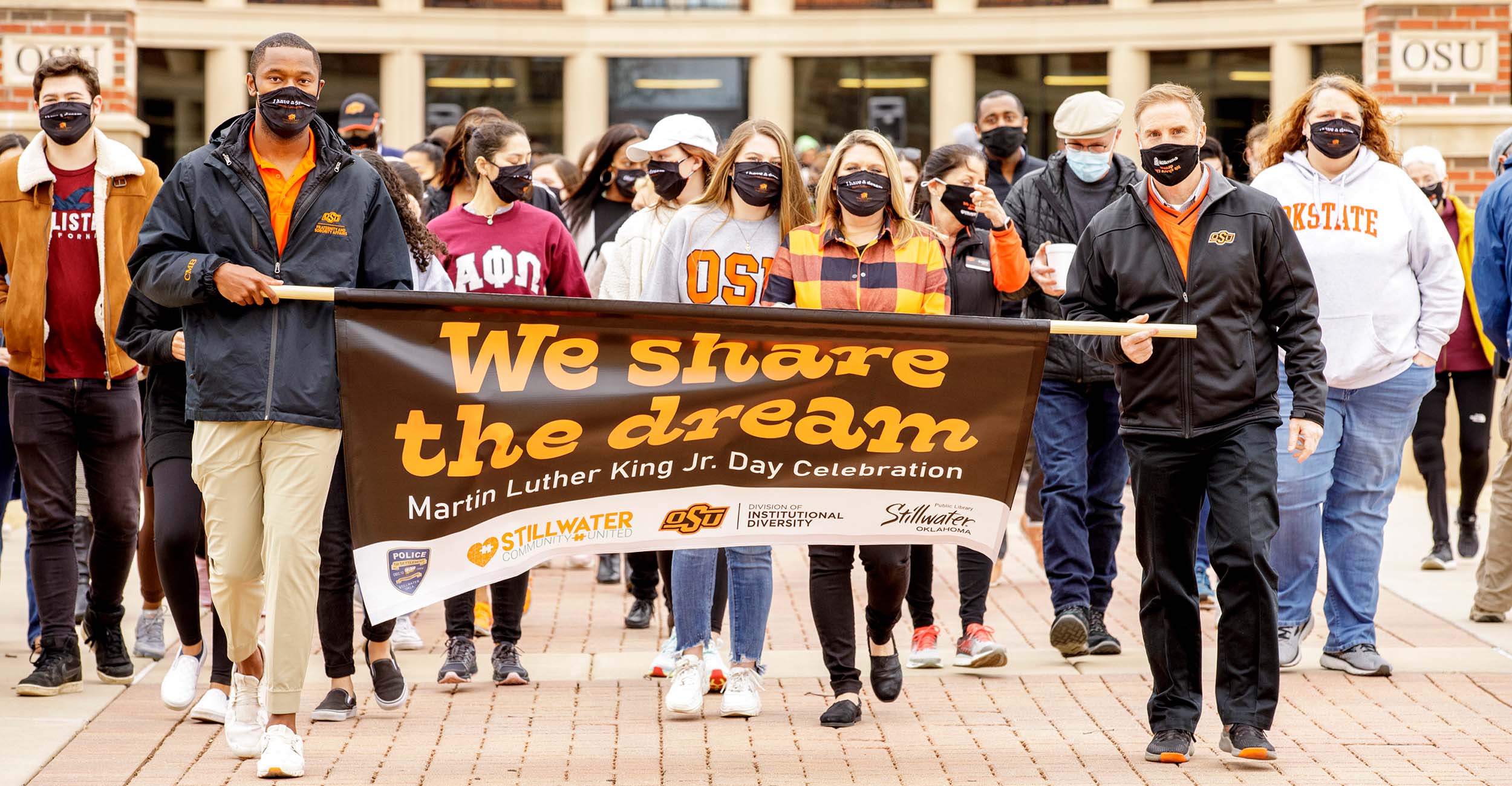 Students and faculty participate in the Martin Luther King Jr. March in 2021.