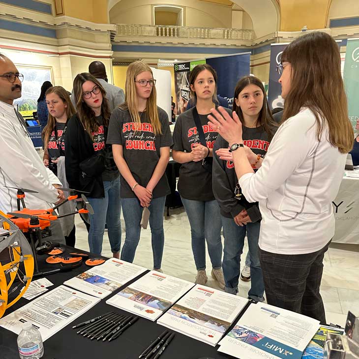 students interact with innovation foundation staff