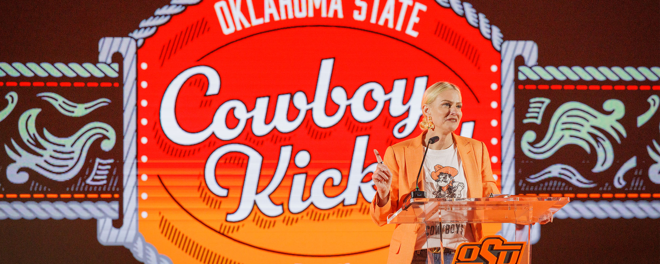 President Shrum takes the stage for Cowboy Kickoff.