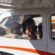 Boy scout in a plane