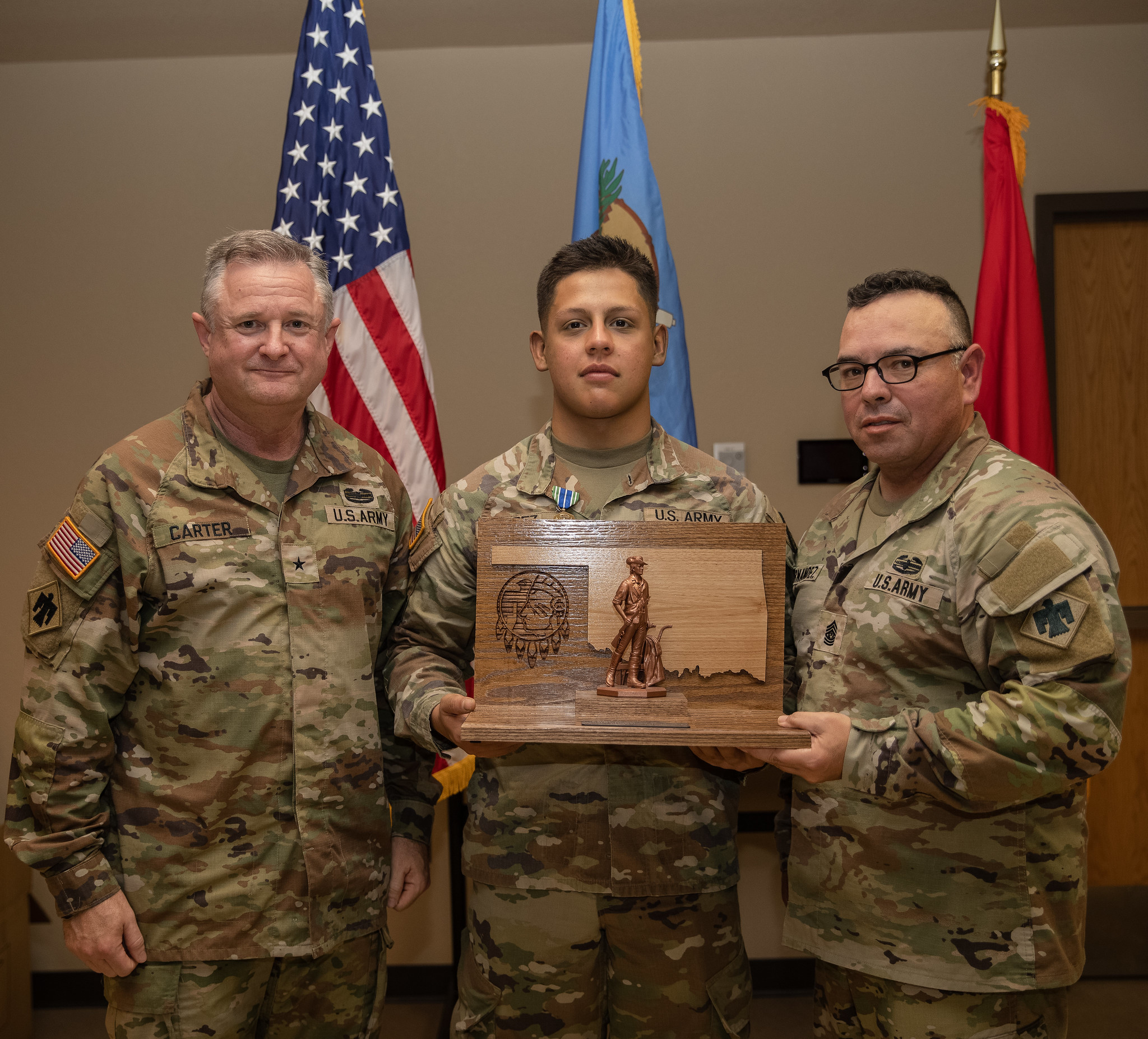 Juan Lopez with Soldier of the Year award