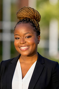 A professional headshot of Alinafe Chinkondenji