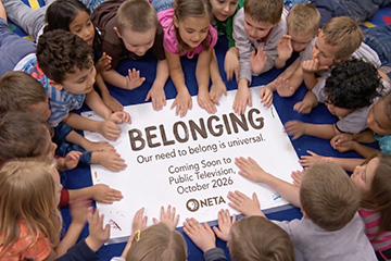children hold sign that says 