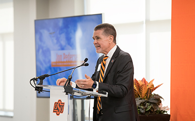 Dean Jon Pedersen speaking at event