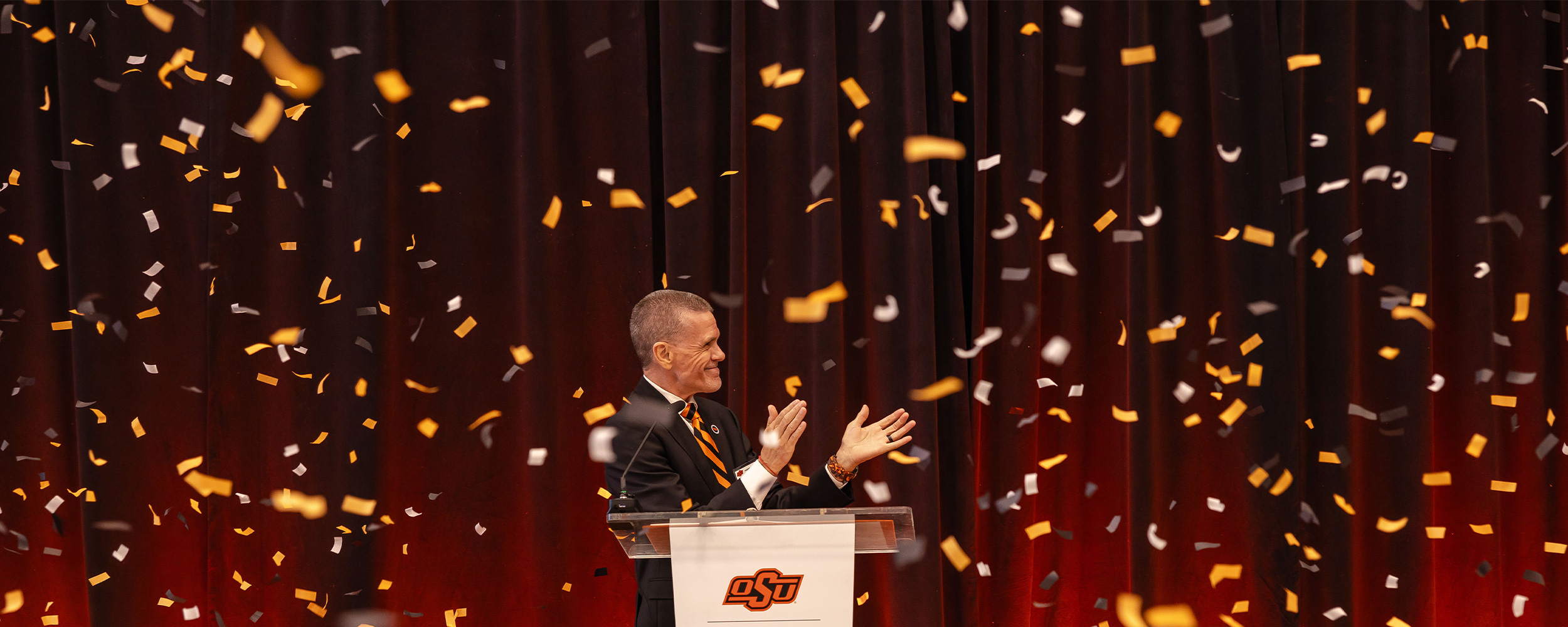 Two students smiling in front of Nancy Randolph Davis building