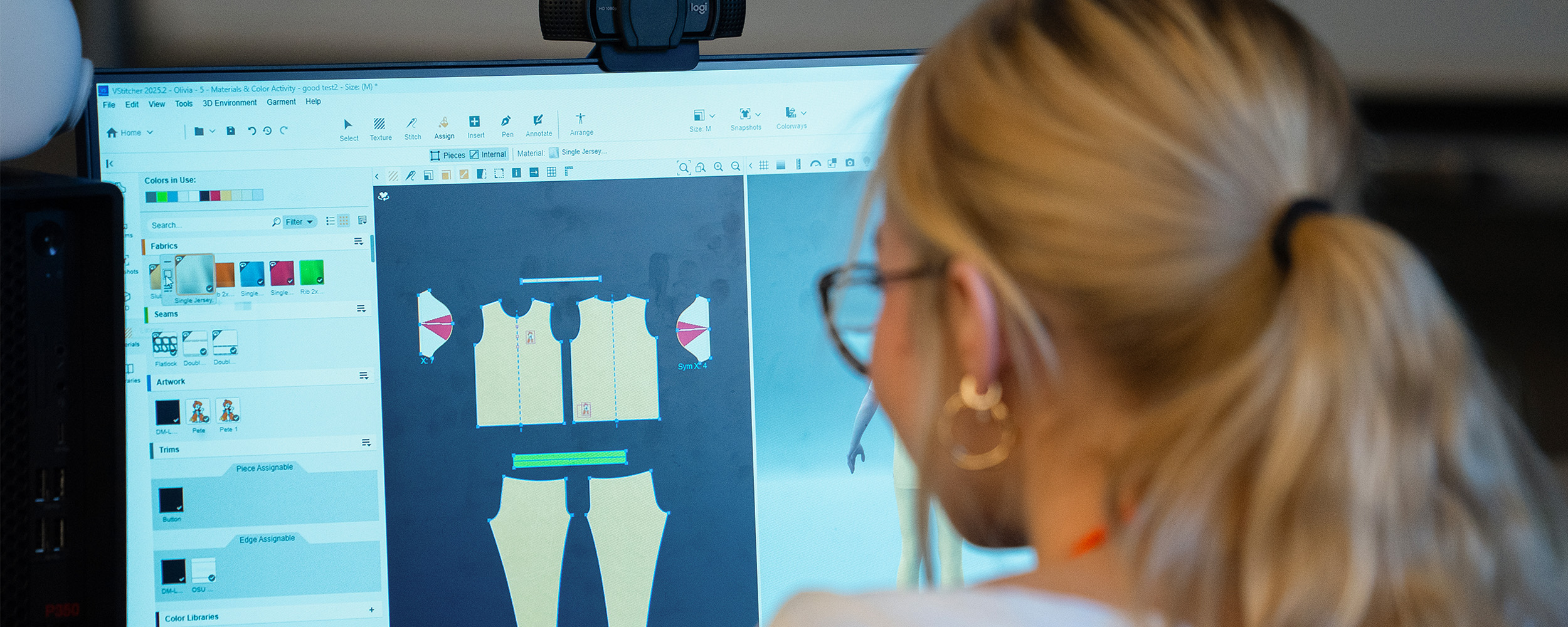 Student working on a fashion piece in a computer lab