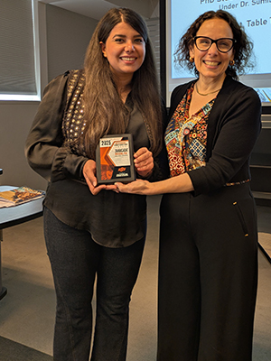 Zahra Hosseini with DM department head Dr. Lynn Boorady