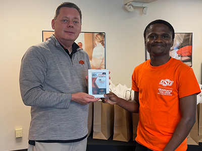 NSCI department head Dr. Norman Hord and Femi Olawale